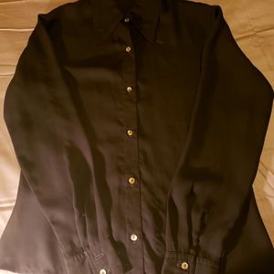 Van Tisse sheer black blouse size medium. Tailored cut.